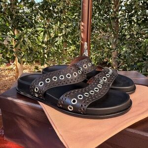 Alaïa Perforated Eyelet Leather Slides